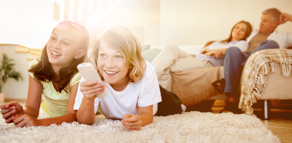 Family relaxing in living room