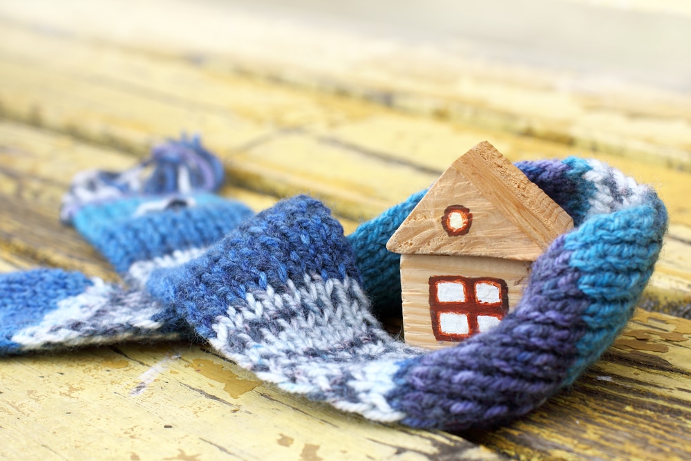 Tiny house wrapped in knit scarf