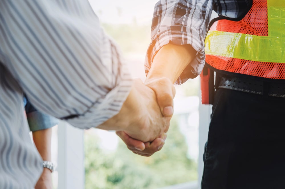 Handshake between contractor and homeowner